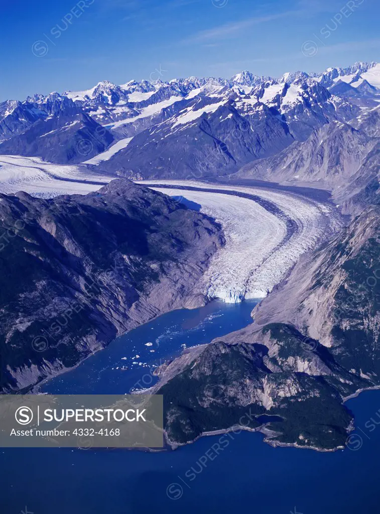 Aerial view of McBride Glacier flowing into Muir Inlet, Glacier Bay National Park, Alaska.