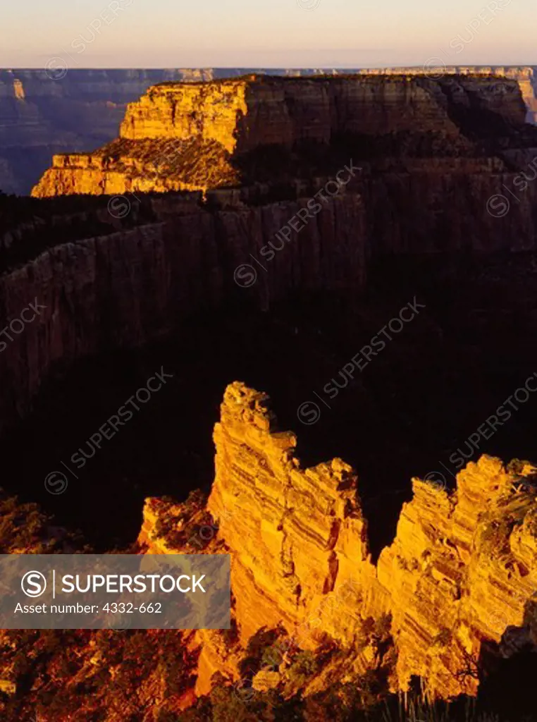 Wotan's Throne illuminated by sunrise light, view from Cape Royal, North Rim of the Grand Canyon, Grand Canyon National Park, Arizona.