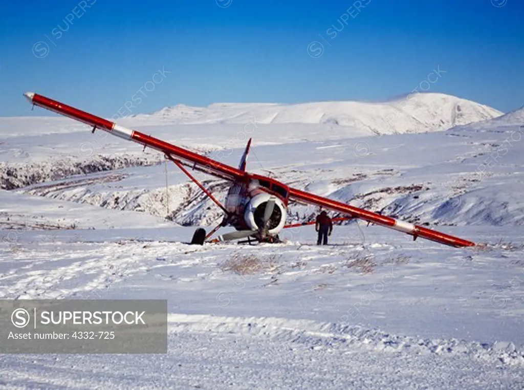 De Havilland DHC3 Otter which careened off the Bonanza Hills Strip after left gear encountered soft snow, Alaska.
