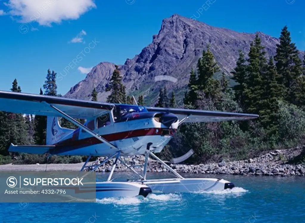 Sky Trekking Alaska's Cessna 185 taxiing from Dick Proenneke's Cabin, Upper Twin Lake, Lake Clark National Park, Alaska.