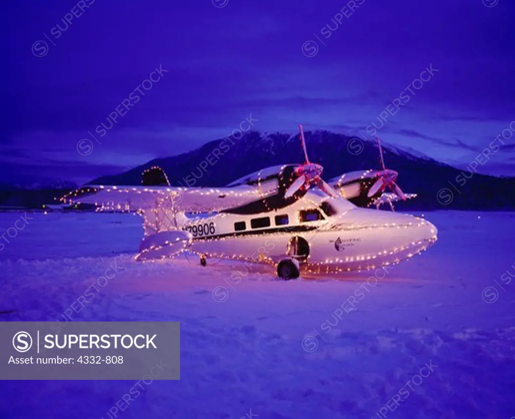 Sky Trekking Alaska's 1943 Grumman G44 Super Widgeon decorated with 1,500 holiday lights, Birchwood Airport, Alaska.