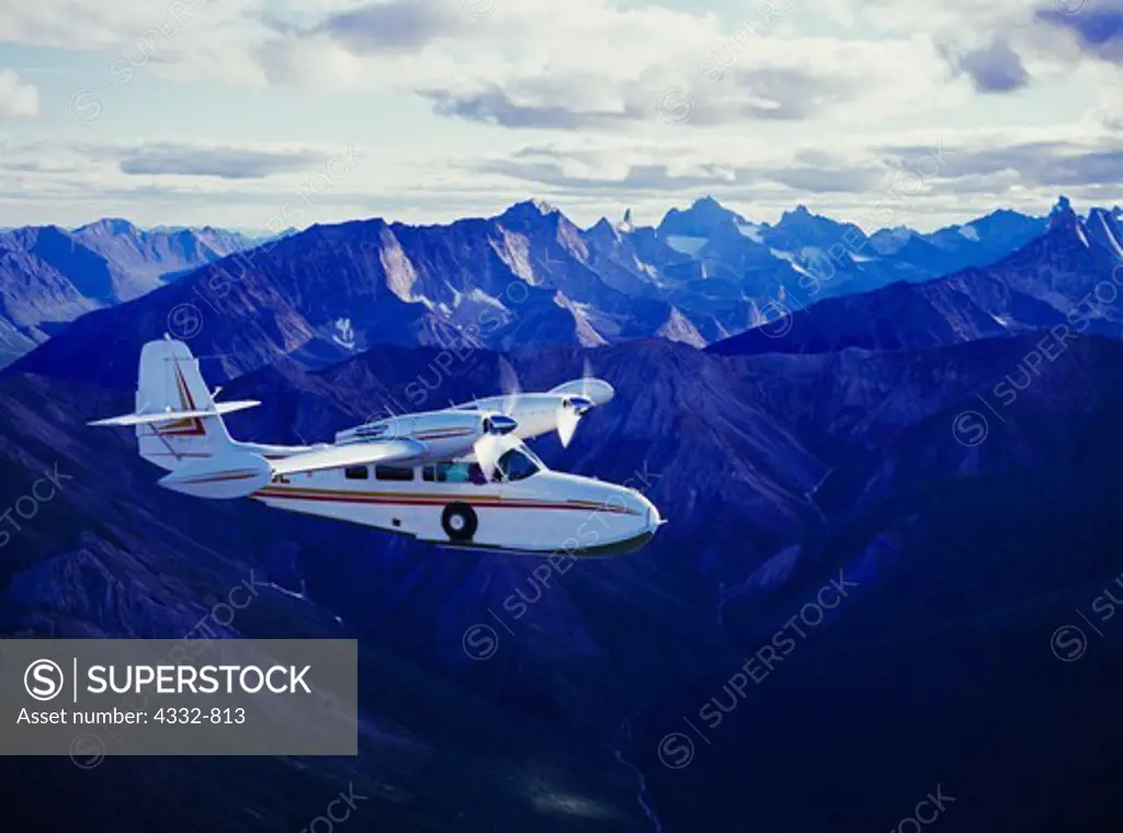 Frontier Flying Service's Grumman Widgeon flying over the Brooks Range, Gates of the Arctic National Park, Alaska.