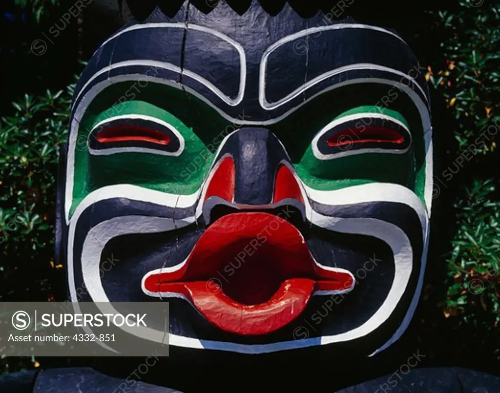 Face of Dzunukwa, the giantess who brought magic and wealth to her people, on the Ga'akstalas Pole, carved by Wayne Alfred and Beau Dick in 1991 and based on a Kwakwaka'wakw design by Russell Smith.  Totem pole on display at Stanley Park, Vancouver, British Columbia, Canada.