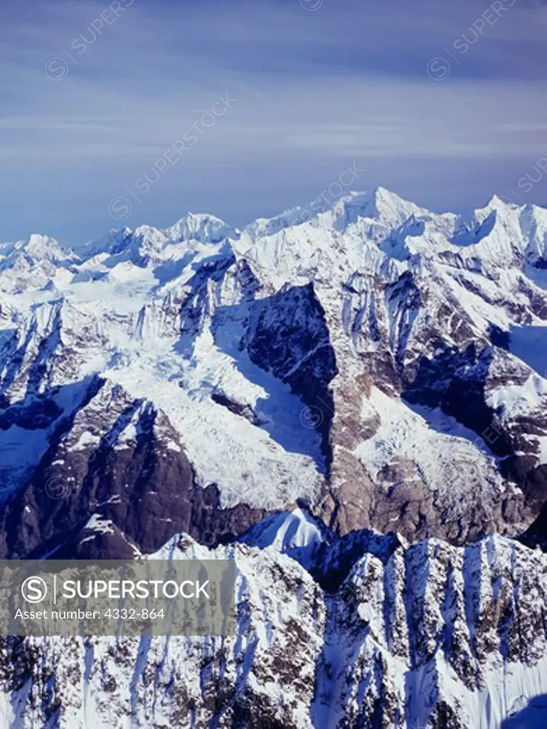 Aerial view south across peaks of the Fairweather Range in British Columbia toward 12,726 foot Mount Crillon in Glacier Bay National Park, Alaska.