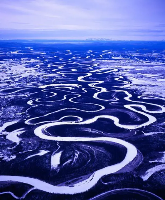 Aerial view in winter of the meandering Big River and associated oxbow lakes east of McGrath, Alaska.