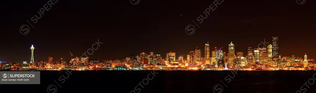USA, Washington, Seattle, Skyline and Space Needle at night from Alki Beach