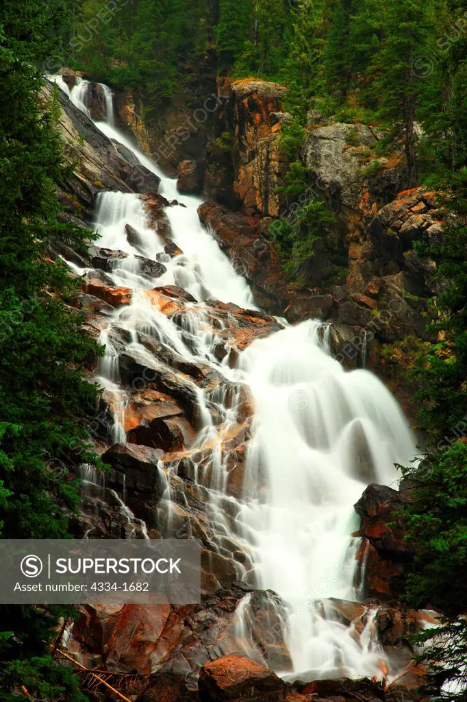 USA, Wyoming, Hidden falls cascades down in Grand Teton National Park