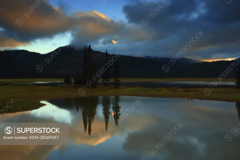Sunset From Sparks Lake With the South Sister Trying To Break Out of the Clouds in The Deschuttes National Forest in Oregon