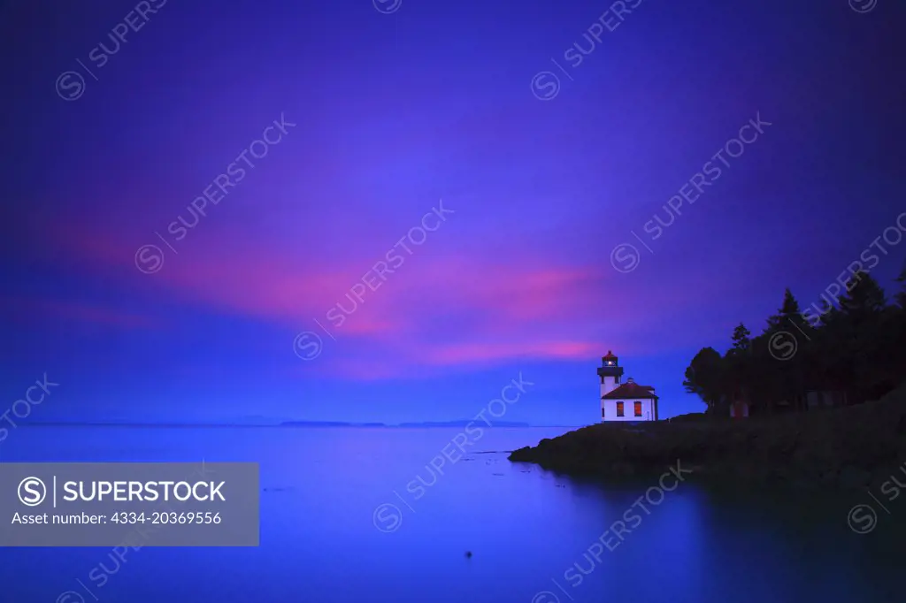 Pre-Dawn Alenglow With the Lime Kiln Point Lighthouse in Lime Kiln Point State Park on San Juan Island in Washington