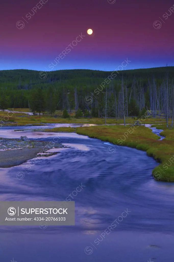 Sunset Alpenglow and Full Moon Over the Madison and Gibbon River Confluence in Yellowstone National Park in Wyoming