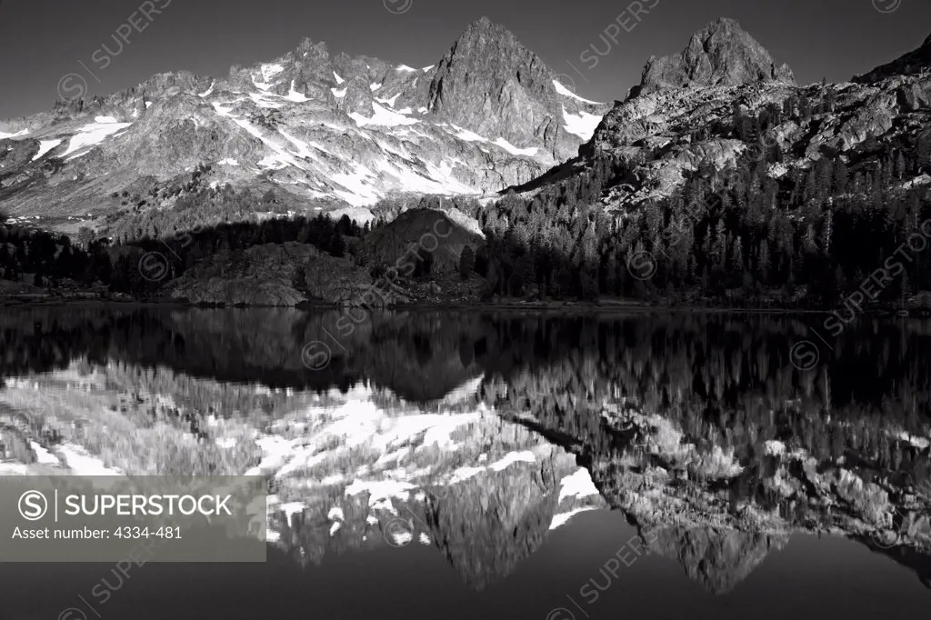 The Minarets with Mount Ritter and Banner Peak Reflecting in Ediza Lake in the Ansel Adams Wilderness, California.