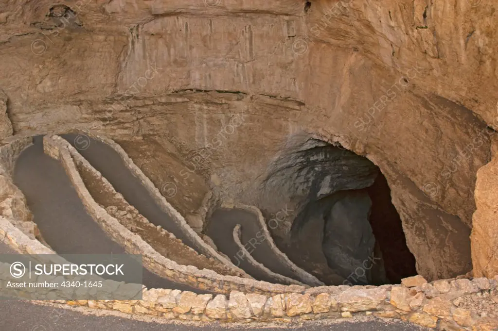 Amphitheater of the Natural Entrance to the wondrous 8.2-acre Big Room cave in Carlsbad Caverns National Park,. The path descends 750 feet into the Earth in the Chihuahuan Desert, New Mexico.