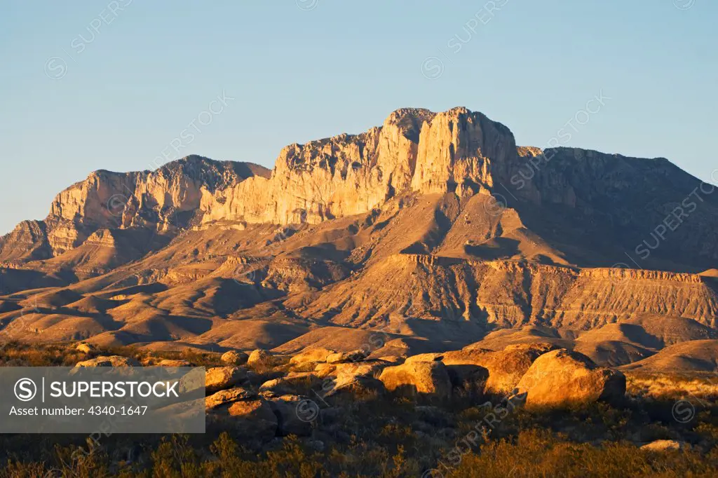 The southern face of El Capitan at sunset in wintertime, Guadalupe Mountains National Park, west Texas.  The Guadalupe Mountains are part of one of the finest examples of an ancient marine fossil reef on Earth.