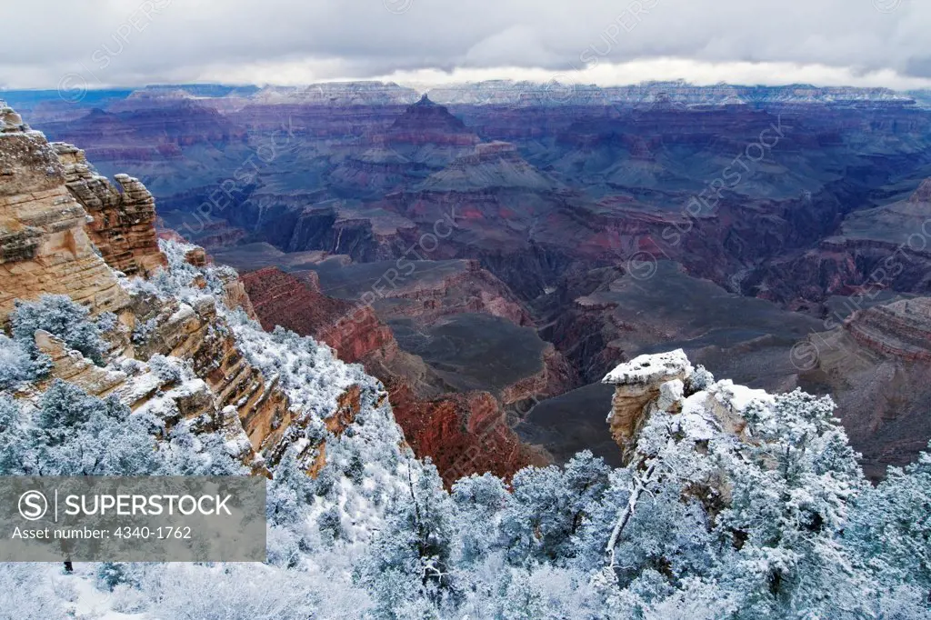 Scenic snowy winter landscape along the South Rim of Grand Canyon National Park, Arizona.