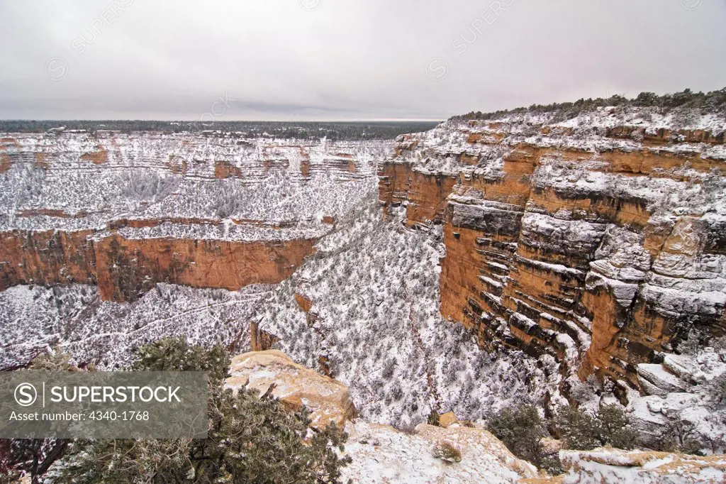 Scenic snowy winter landscape along the South Rim of Grand Canyon National Park, Arizona.
