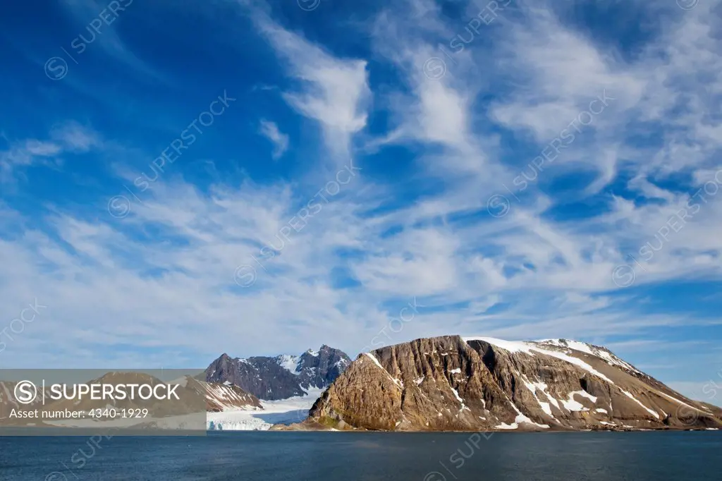 Rugged glacial landscape along Hornsund, southern Svalbard archipelago, Norway, in summertime.
