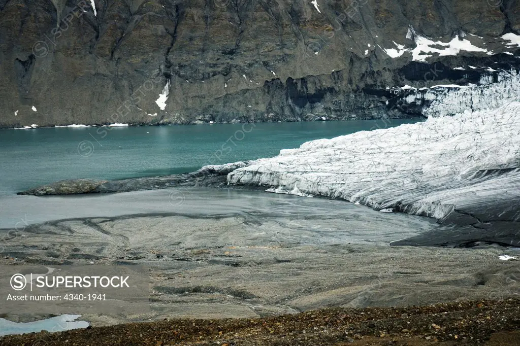 Glacial landscape of Osbornebreen - a retreating glacier in St. Jonsfjord, west coast of Svalbard, Norway.