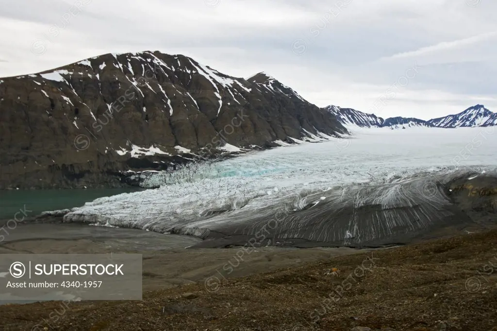 Glacial landscape of Osbornebreen-a retreating glacier in St. Jonsfjord, west coast of Svalbard, Norway.