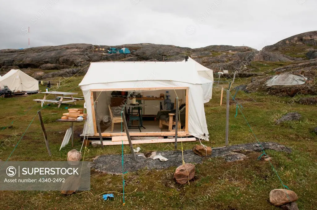 Interior view of a tent tied down with rocks located in a scientific base camp along the Sylvia Grinnell River, Sylvia Grinnell Territorial Park, outside the capital city of Iqaluit, Baffin Island, Nunavut, Canada