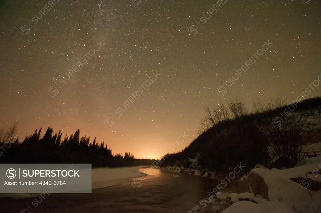 USA, Alaska, Recreational Area, Chena River State, Northern lights (Aurora borealis) glowing brightly over Chena River