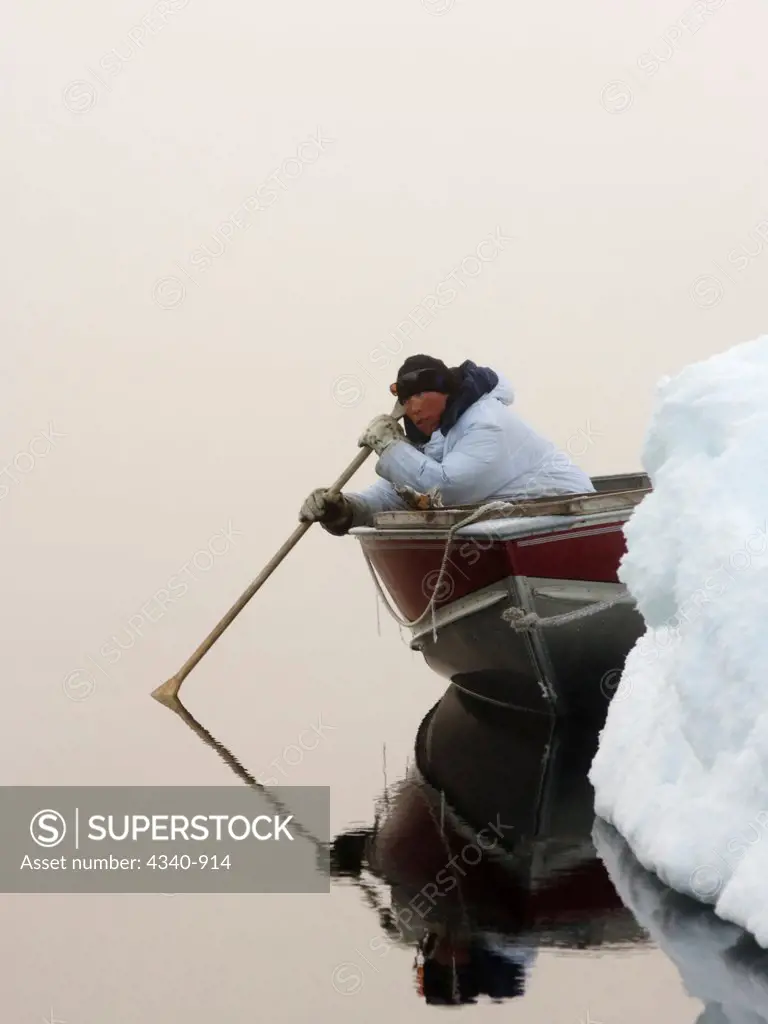 Inupiaq Subsistence Hunter Listens For Passing Bowhead Whales