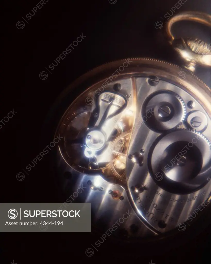 A Pocket Watch with Gears Showing