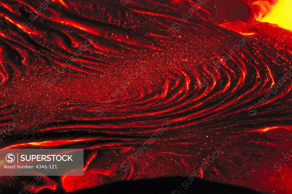 A River of Slow Moving Glowing Hot Pahoehoe Begins to Crust But is Still Molten Underneath