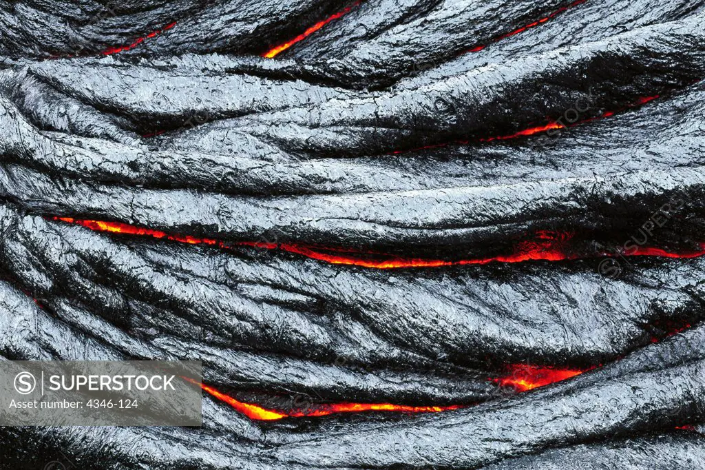Rope-Like Glowing Hot Pahoehoe Cooling But Still Molten Underneath