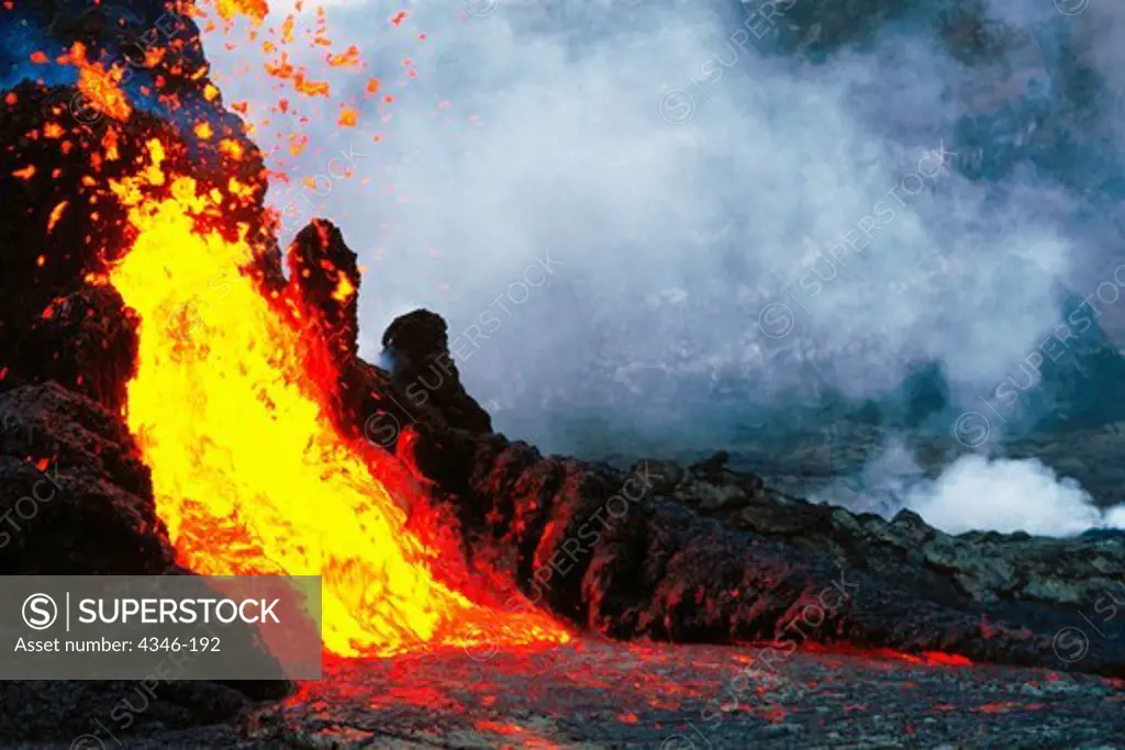 Lava Pours From Spatter Cones within Pu'u O'o Vent