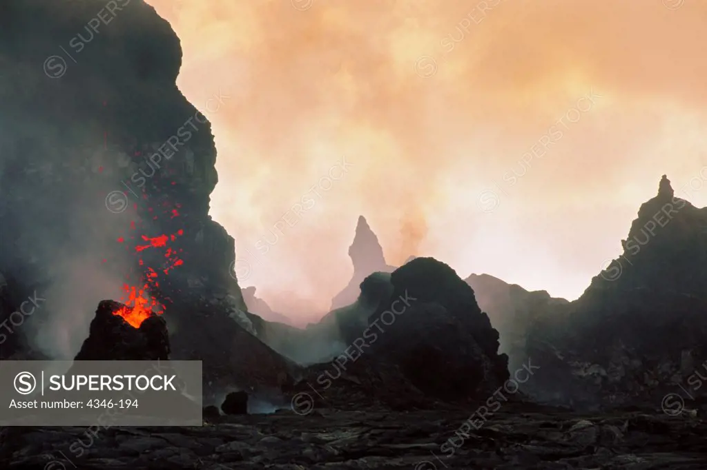 The Alien Landscape of Erupting Spatter Cone and the Sun on Kilauea Volcano.