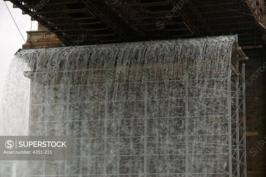 Artist Olafur Eliasson created a series of artificial waterfalls in and around Manhattan and New York harbor, like this one under the Brooklyn Bridge.