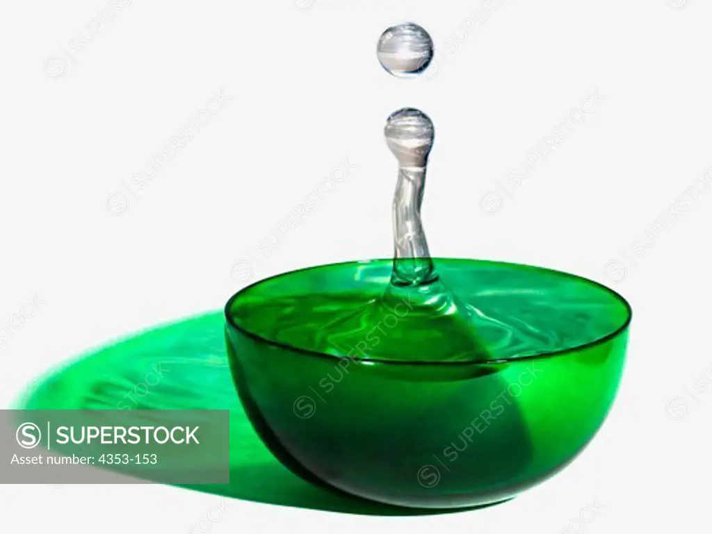 Water Droplet Splashes in a Green Bowl