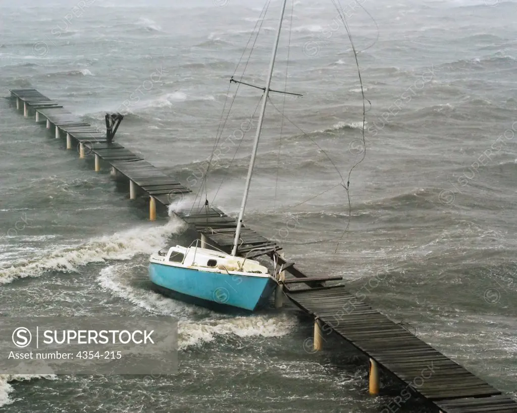A Sailboat is Battered by the Winds of Hurricane Frances