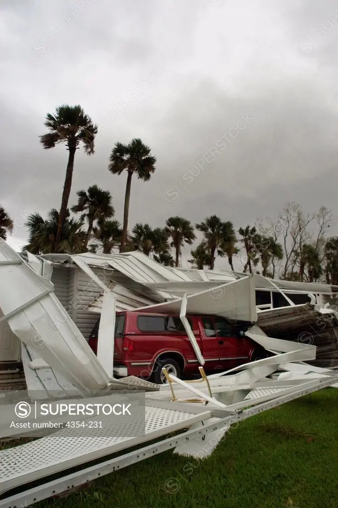 Hurricane Jeanne Buries a Truck Under Mobile Home Debris