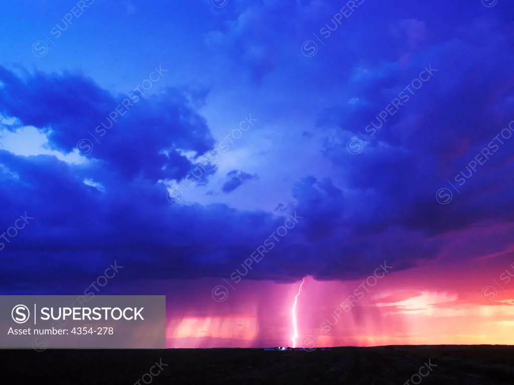 Cloud To Ground Lightning During a Sunset Thunderstorm