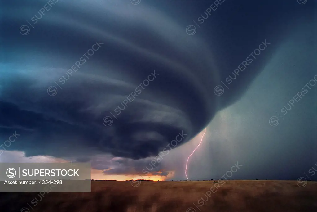 Cloud To Ground Lightning During a Sunset Supercell Thunderstorm