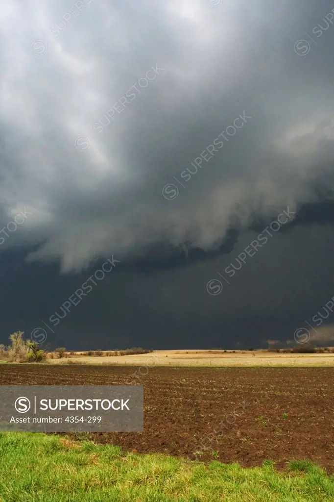 Low Threatening Tornadic Thunderstorm Over Farmland