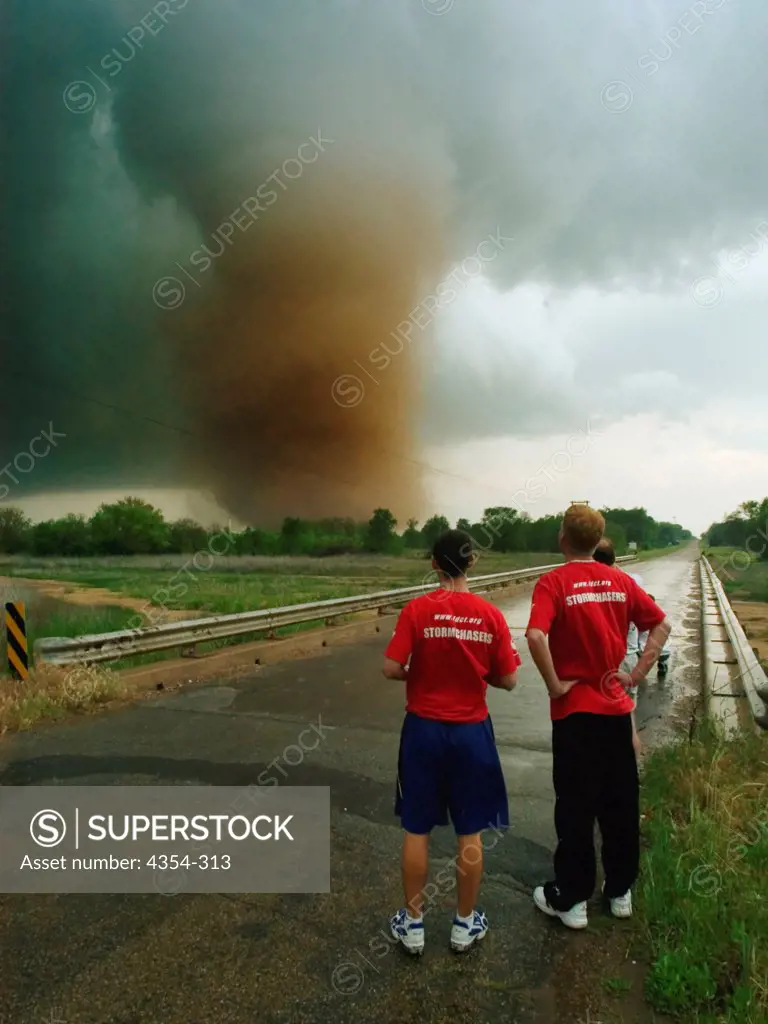 Storm Chasers Watch a Large Tornado
