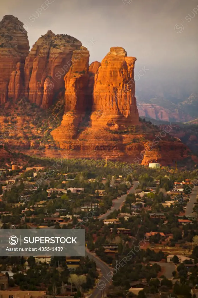 Sedona at sunset , Arizona. Sedona is a city and community that straddles the county line between Coconino and Yavapai Counties in the northern Verde Valley region of the U.S. state of Arizona. Sedona's main attraction is its stunning array of red sandstone formations, the Red Rocks of Sedona. The formations appear to glow in brilliant orange and red when illuminated by the rising or setting sun. The Red Rocks form a breathtaking backdrop for everything from spiritual pursuits to the hundreds of