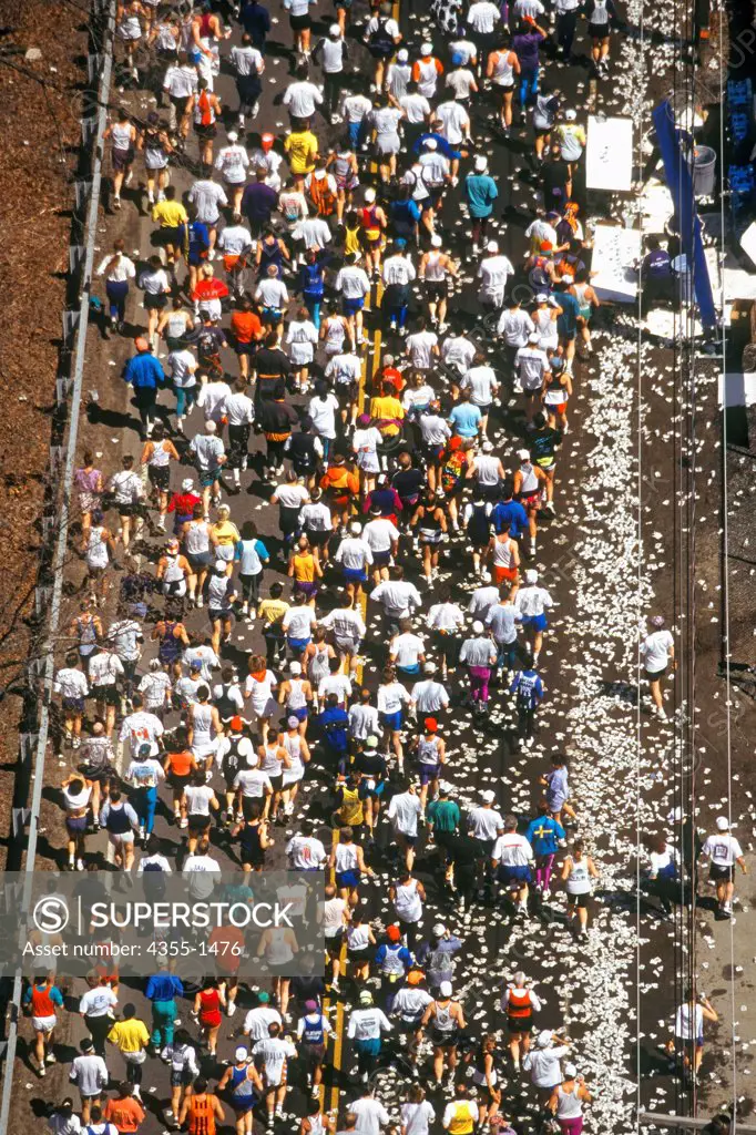 Looking down at a water stop station during the Boston Marathon.