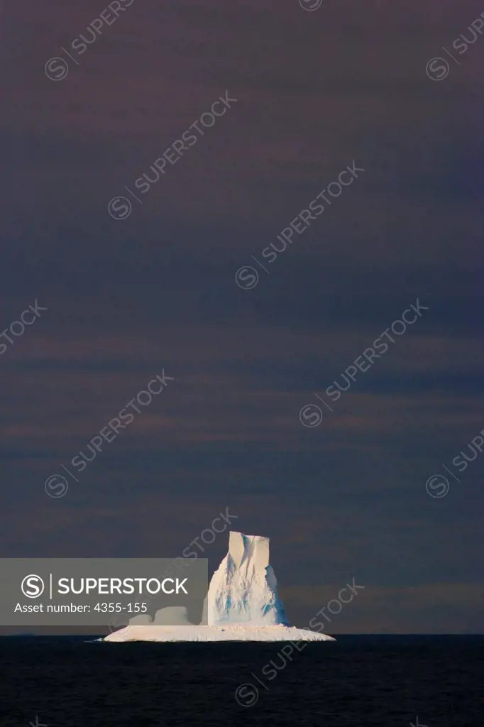 A Lone Iceberg Drifts Near Deception Island in Antarctica