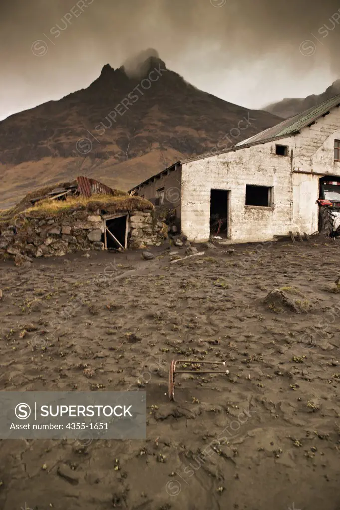 The Seljavellir Farm on the East side of the Eyjafjallajokull Volcano in Iceland is covered in thick black ash.