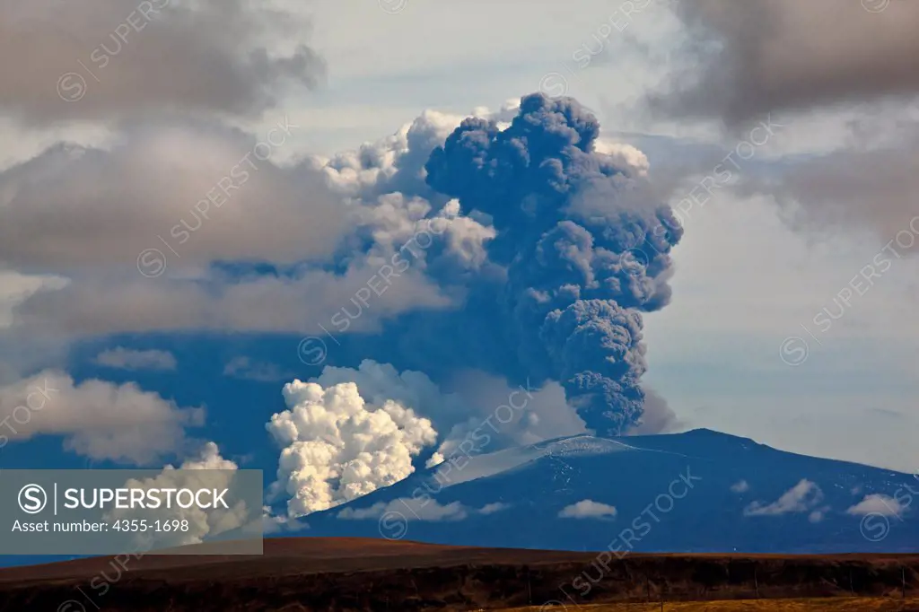 Steaming craters and an explosion at The Eyjafjallajokull volcanic eruption on Mt. Eyjafjoll in Iceland.