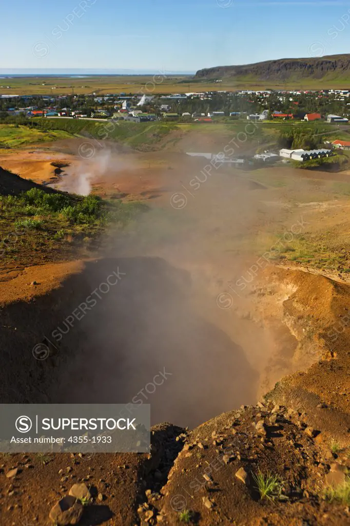 Steam emerging from vents and mudpots in Hverageroi, Iceland. Hverageroi is a small town in the south of Iceland located 45 km to the east of Reykjavk, Iceland. A large earthquake on May 30, 2006 opened up the earth creating a series of vents and fumaroles of bubbling mud and steam.