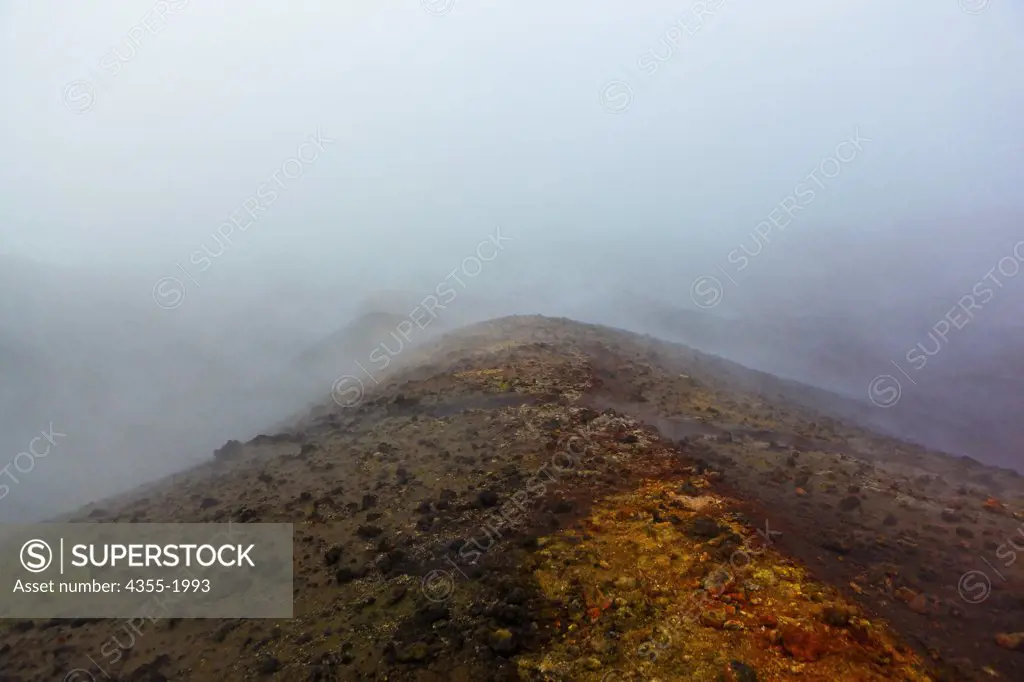 Steam rising from the ground at the summit of The Eyjafjallajokull Volcano in Iceland one year after the eruption. Lava broke through the Gigjokull Glacier causing violent eruptions and large amounts of ash that caused worldwide aviation nightmares shutting down almost all of Europe for days in 2010.
