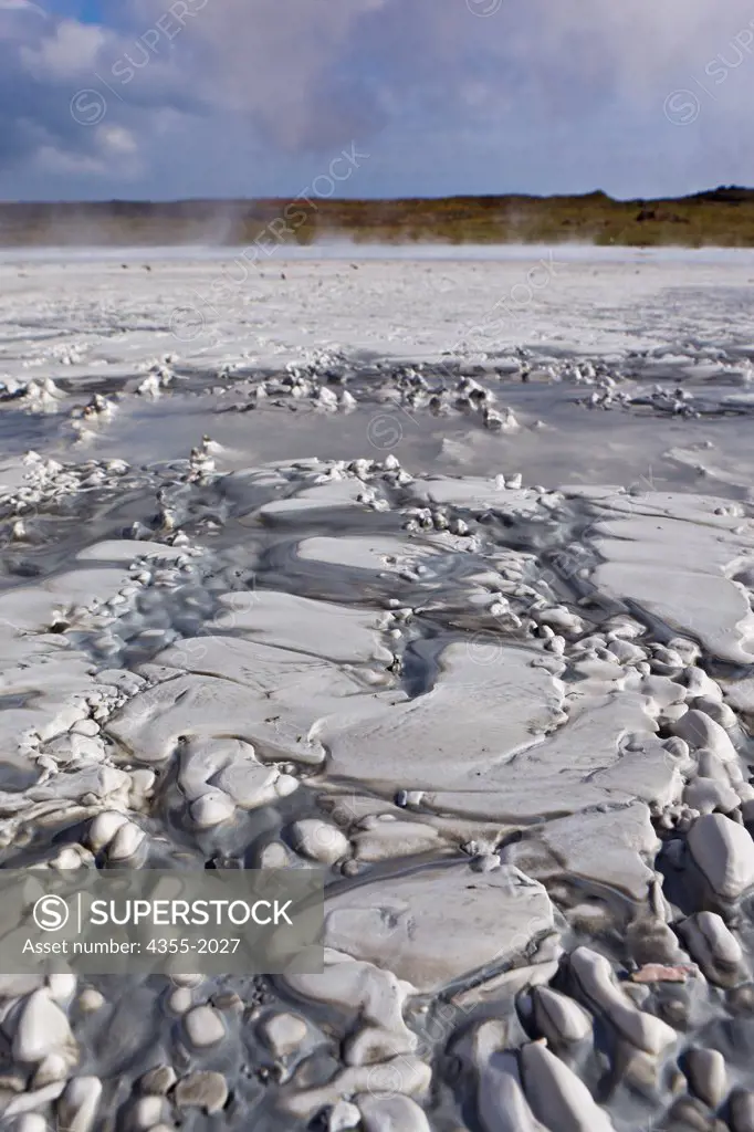 Silica deposits on the shoreline around a geothermal area near Reykjanesvirkjun, Iceland.