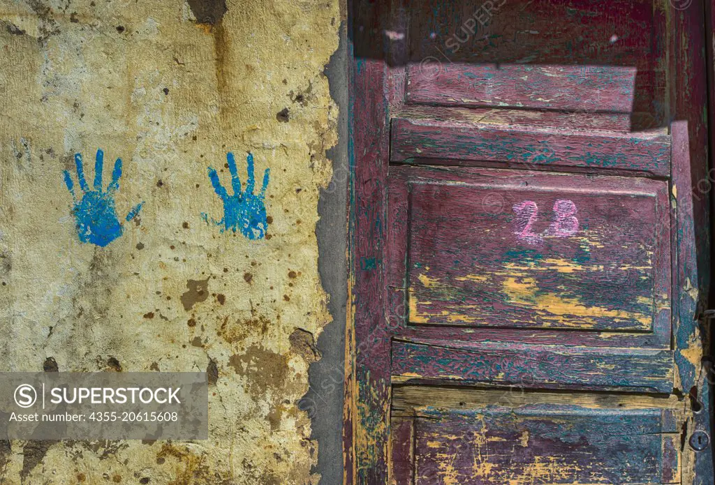 Handprints on the wall of an old home in the Atacama Desert of Argentina