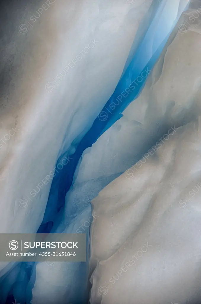 A blue striated iceberg off of Cuverville Island, Antarctica