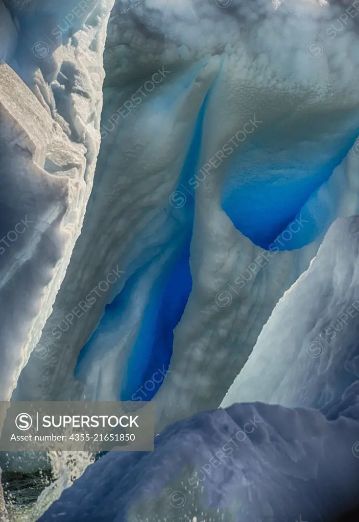 Deep blue ice in an iceberg off of Cuverville Island, Antarctica