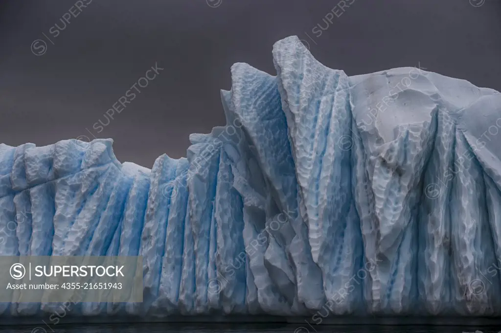Large striated iceberg in the Iceberg Graveyard, Antarctica